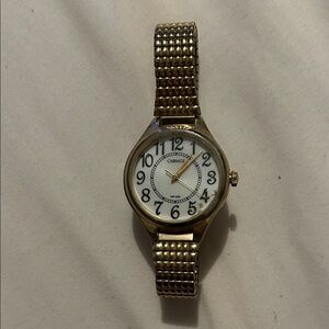 Carriage Boutique Gold Tone Women's Watch with White Dial